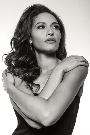 elegant woman crossed arms bw